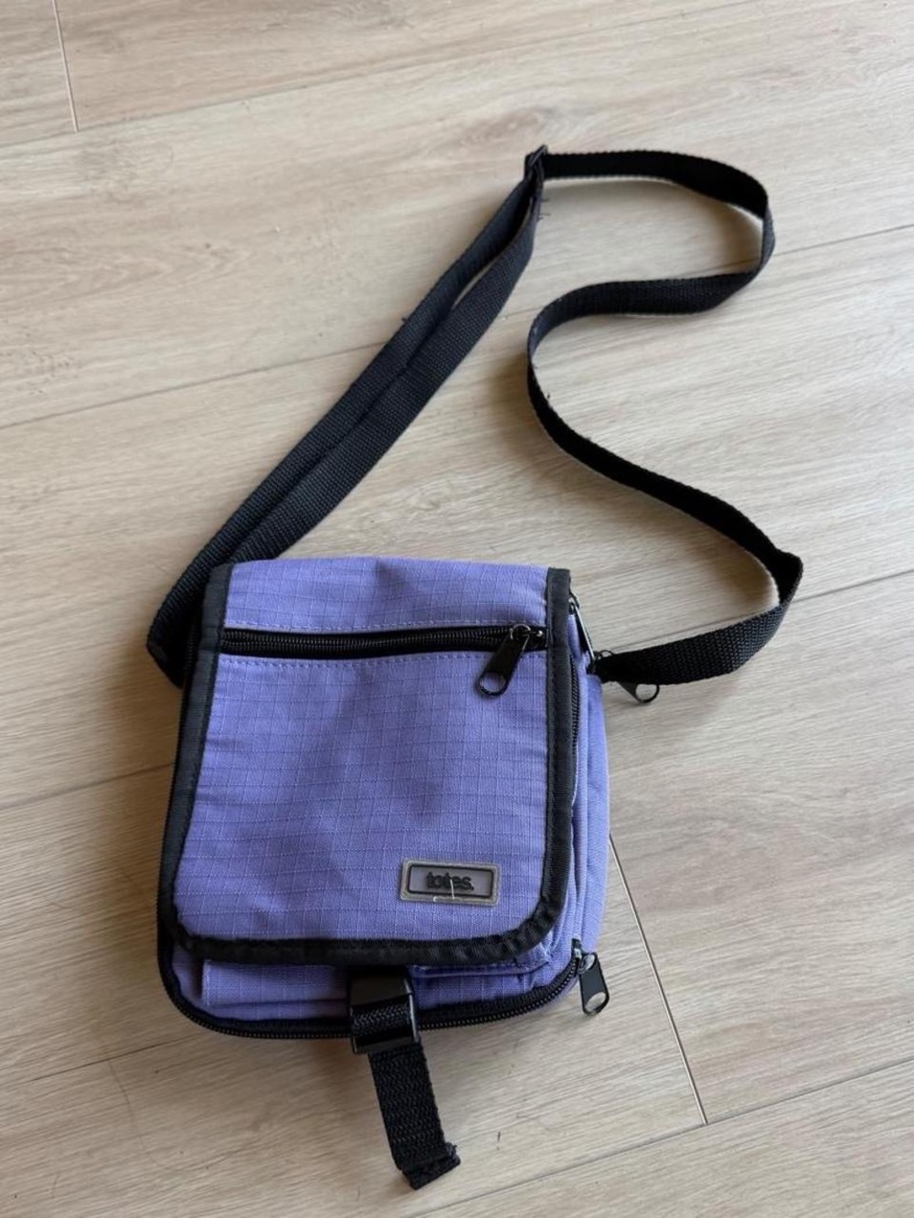 totes Lavender Crossbody Travel Bag with Black Trim